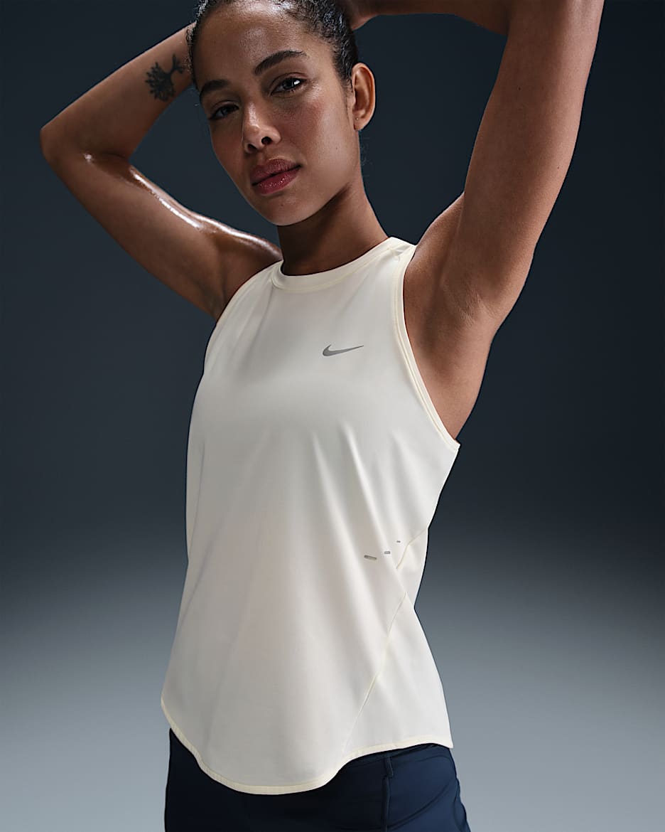 Nike Swift Women's Dri-FIT Running Tank Top. Nike HU Nike Swift Women's Dri-FIT Running Tank Top. Nike HU